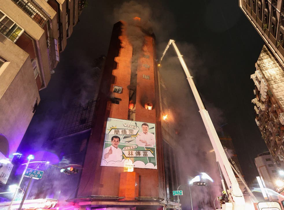 <p>Smoke billowed from the building during the night</p>