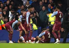 Aston Villa’s Matty Cash and Lucas Digne hit by bottle thrown from Everton crowd while celebrating