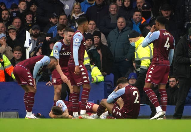 <p>Aston Villa players react after a bottle is thrown from the stands</p>