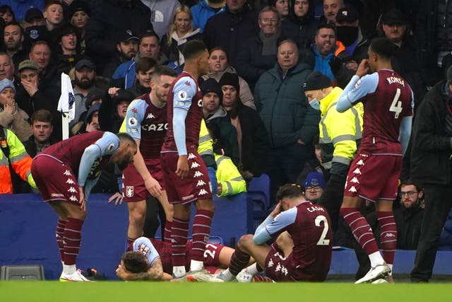 <p>Aston Villa players react after a bottle is thrown from the stands</p>