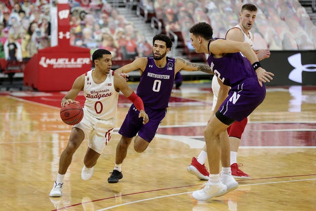 <p>The Wisconsin Badgers playing the Northwestern Wildcats at a game on 20 January 2021</p>