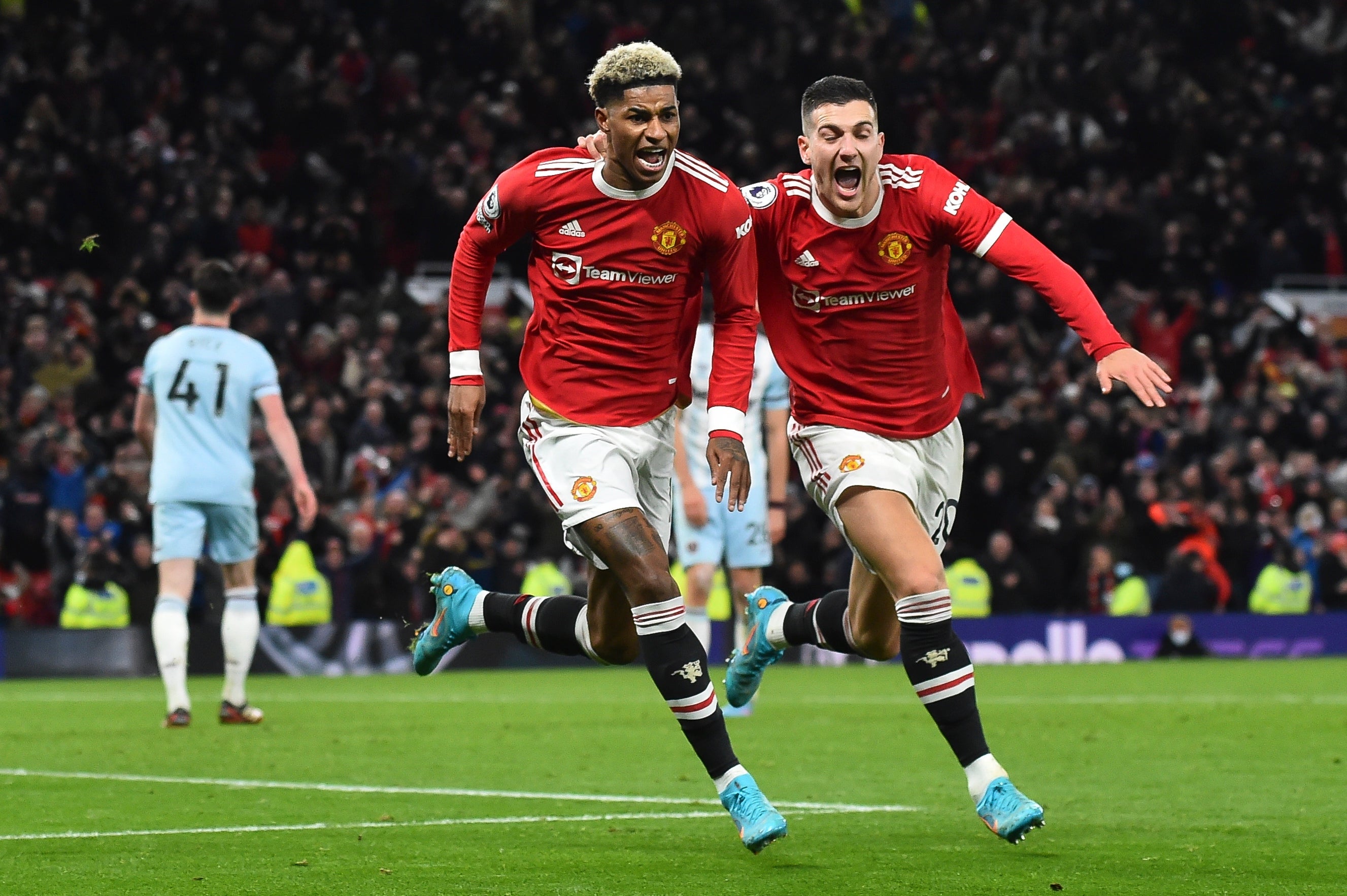 Marcus Rashford and Diogo Dalot celebrate Manchester United’s added-time winner