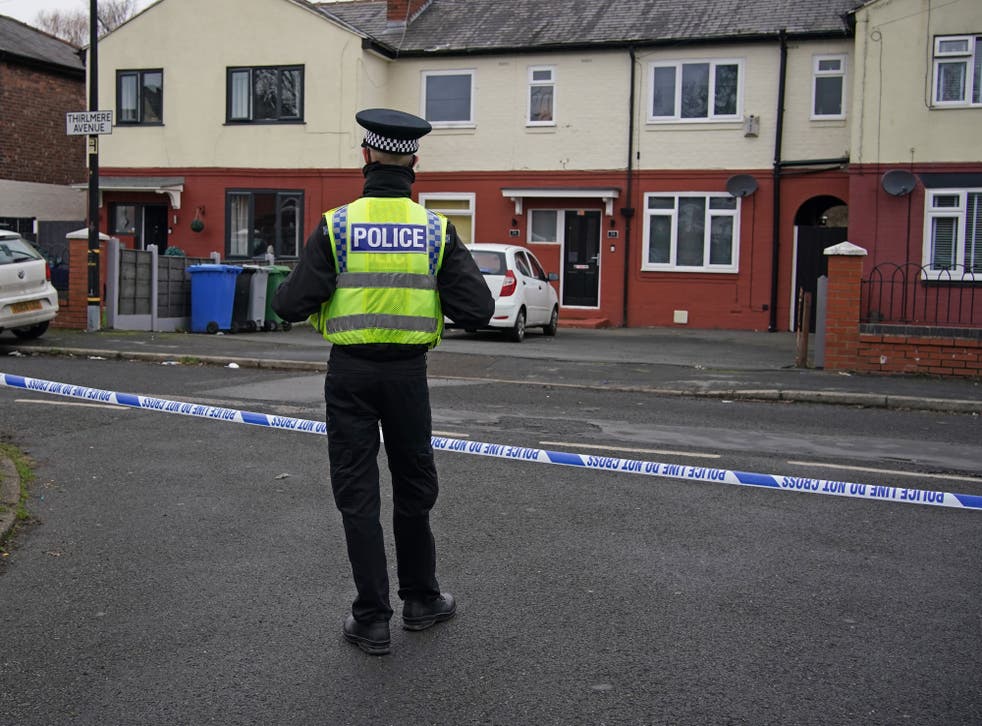 Police at the scene after a 16-year-old boy was fatally stabbed on on Thirlmere Avenue in Stretford, Manchester (Peter Byrne/PA)
