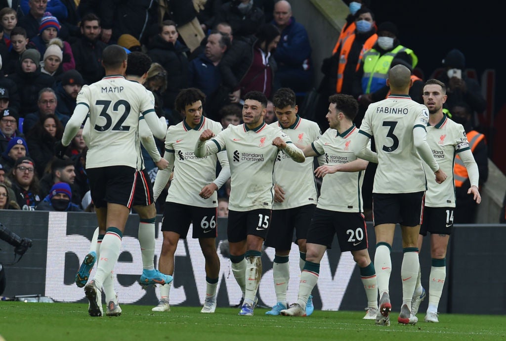 Alex Oxlade-Chamberlain (centre) celebrates after scoring Liverpool’s second goal at Selhurst Park