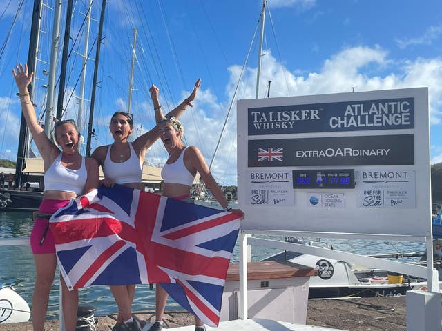 L-R British rowers Abby Johnston, Charlotte Irving and Kat Cordiner smashed the world record for rowing across the Atlantic (PA).