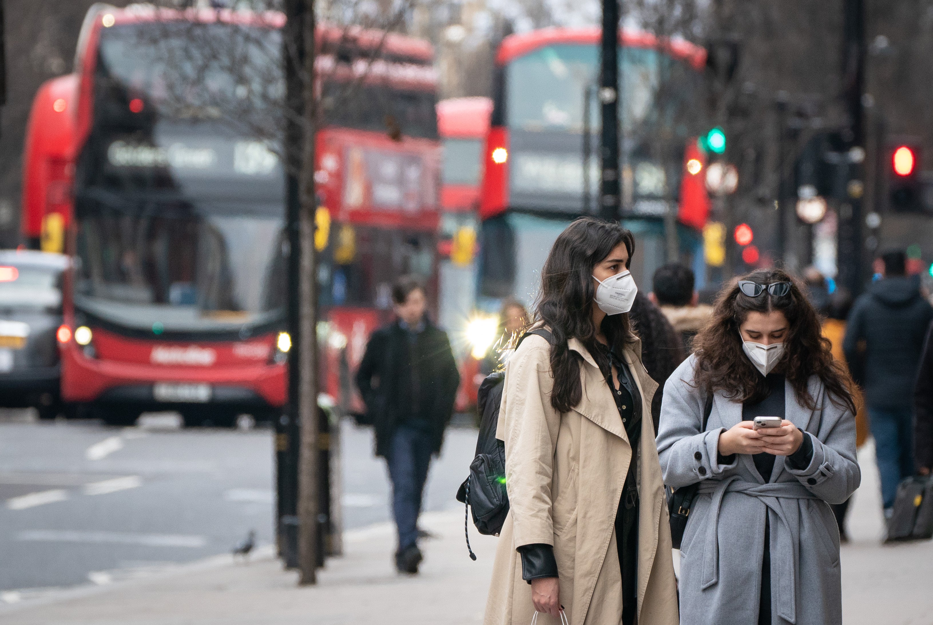 Shoppers wearing face masks on Oxford Street, in central London (Dominic Lipinski/PA)