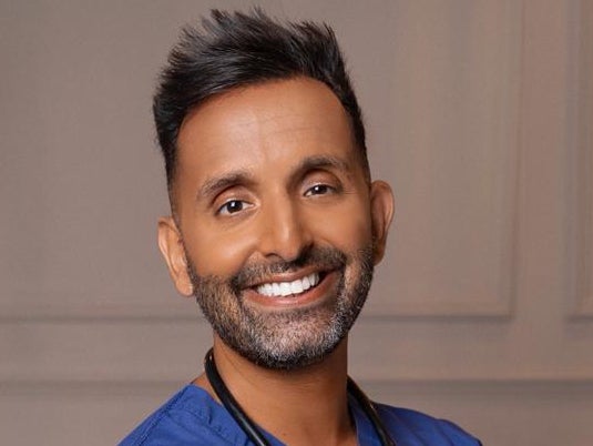 <p>Amir Khan, a GP based in Bradford, says with people juggling busy lives the NHS is ‘making it as easy as possible for you to get your booster’ </p>