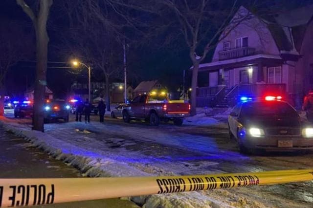 <p>The scene in Milwaukee after six bodies were discovered in a home on Sunday</p>