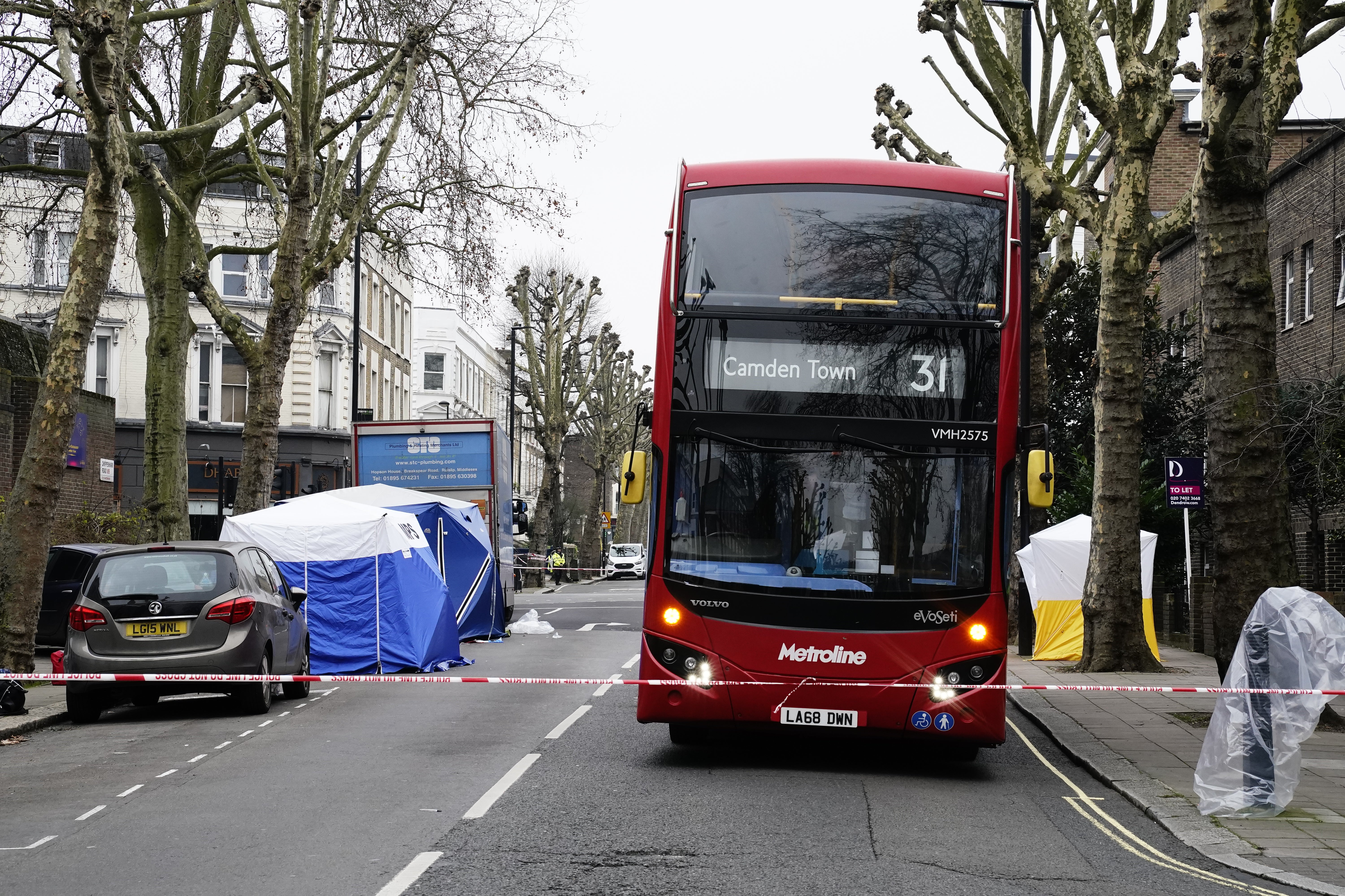 Forensic tents (left) at the scene in Chippenham Road, Maida Vale (Aaron Chown/PA)
