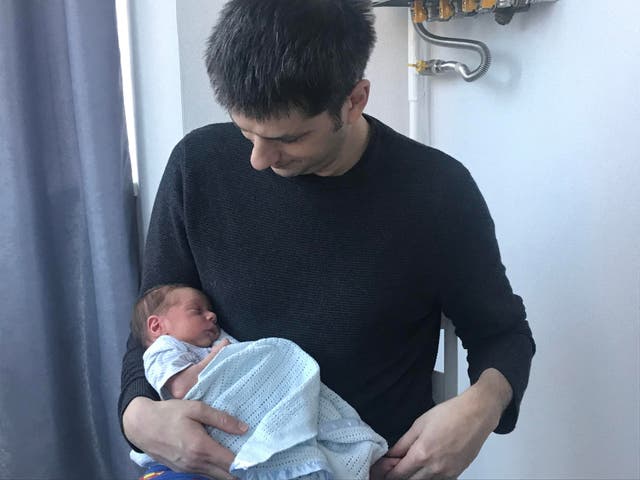 Ben Garratt and his wife are living in Ukraine to oversee paperwork after the surrogate birth of their baby, Raphael (Ben Garratt/PA)