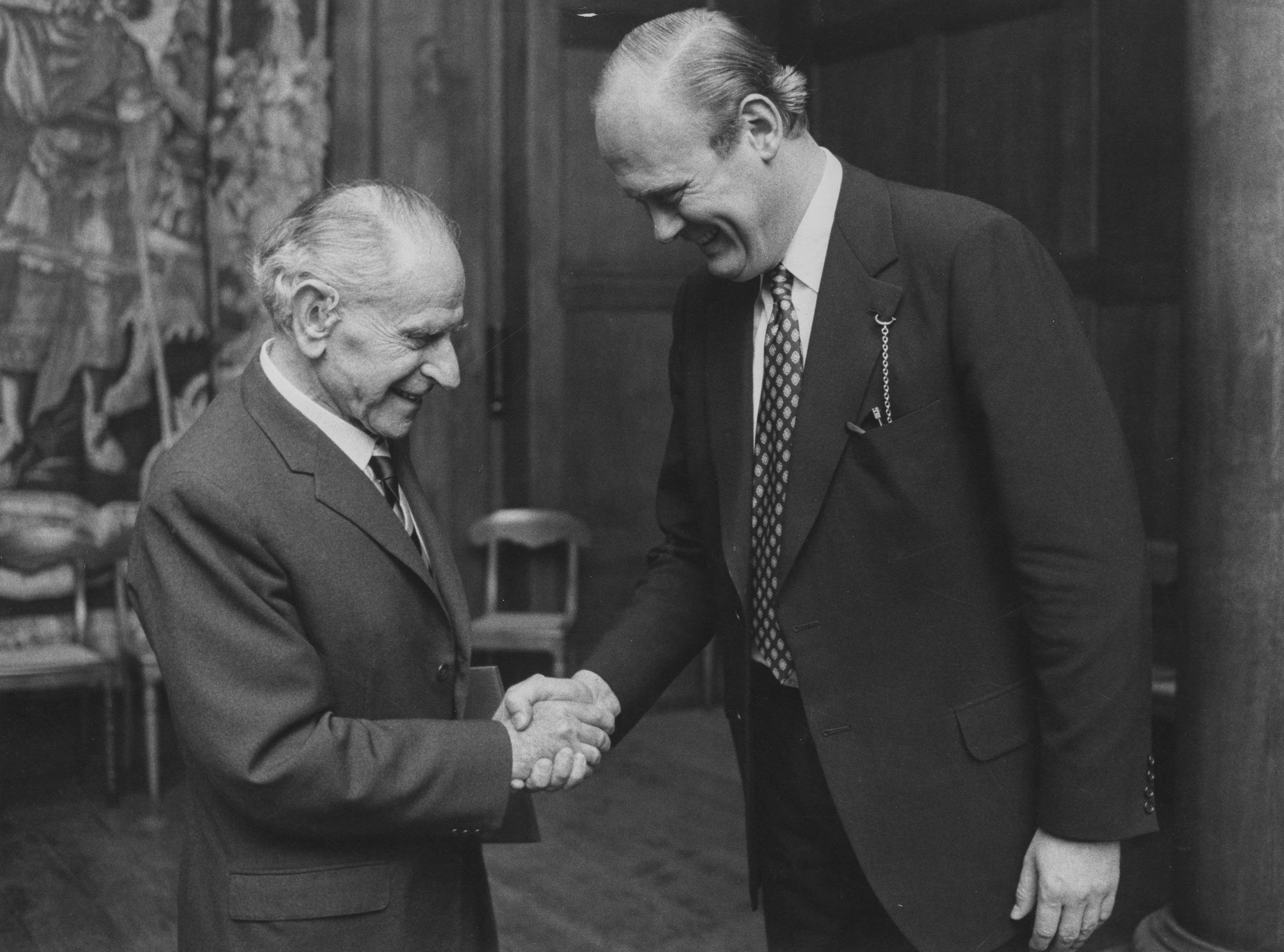 Philosopher Sir Karl Popper (left) being presented with the Sonning Prize