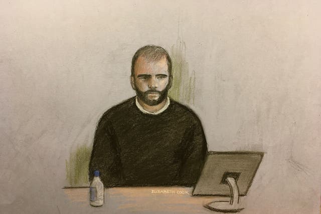 Court artist sketch by Elizabeth Cook of Nathan Smith, 38, watching video footage in the dock at Bristol Crown Court, where he is accused of the manslaughter of suspected burglar Craig Wiltshire (PA)