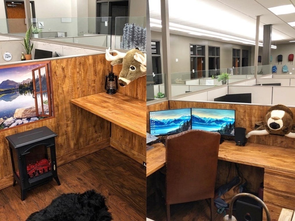 Employee transforms office cubicle into rustic cabin complete with fireplace