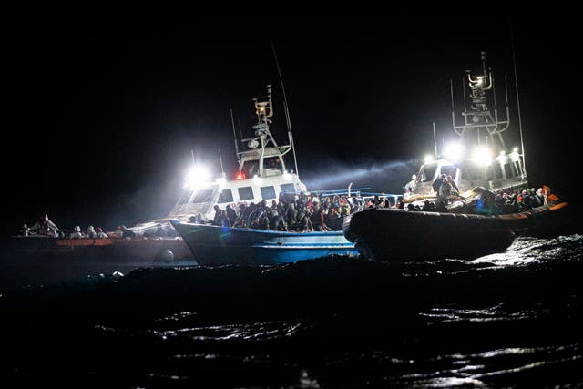 <p>Migrants are rescued off the coast of Lampedusa, Italy, 24 January 2022</p>