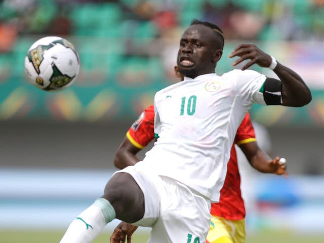 Sadio Mane helped Senegal reach the quarter-finals, but was taken off following a clash of heads during the second half (Sunday Alamba/AP)