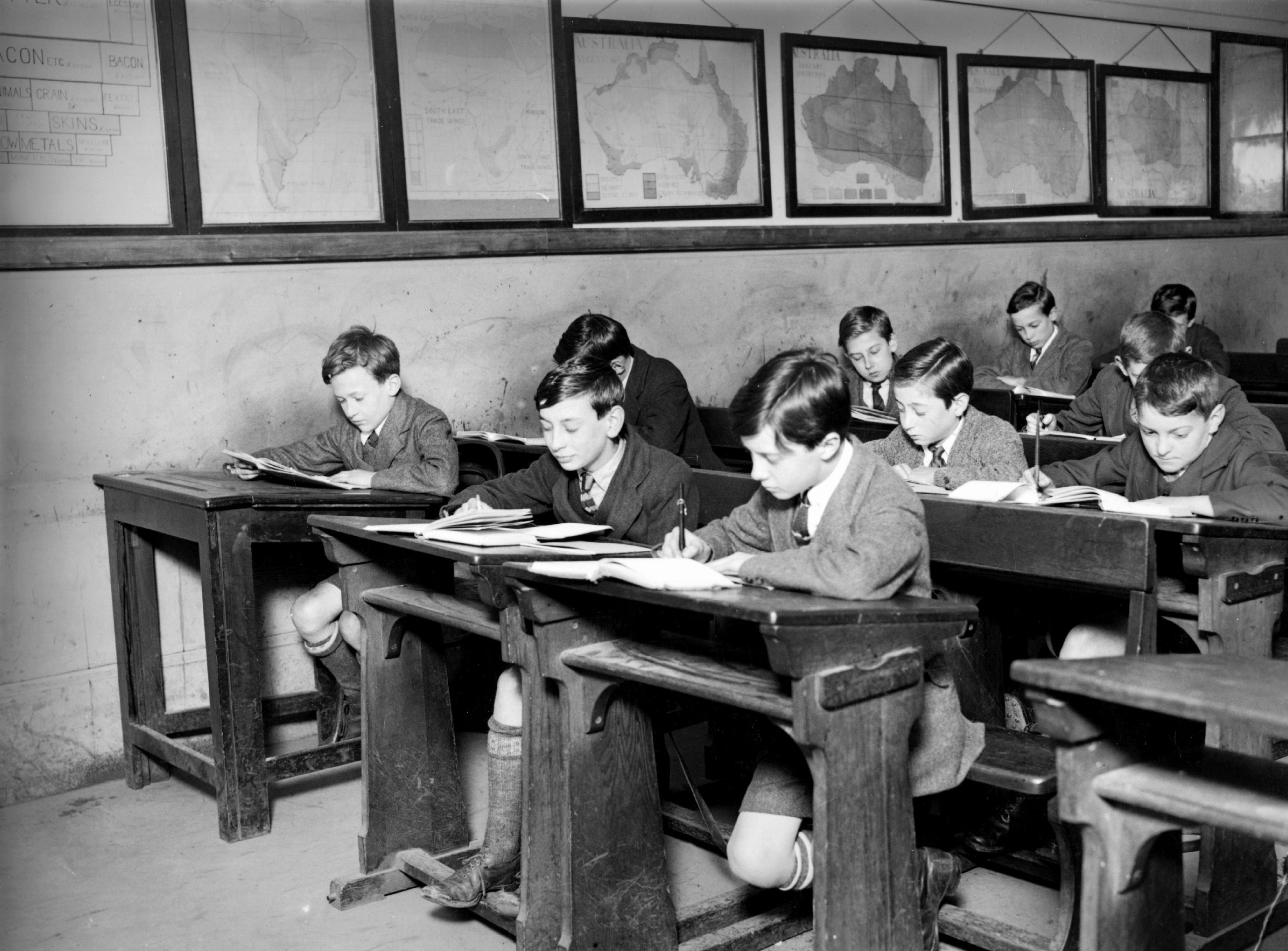 May 1922: Boys at work in their classroom. (Photo by Topical Press Agency/Getty Images)