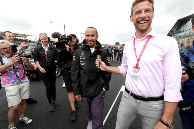 Jenson Button (right) believes old team-mate Lewis Hamilton (centre) will race in the 2022 F1 season (David Davies/PA)