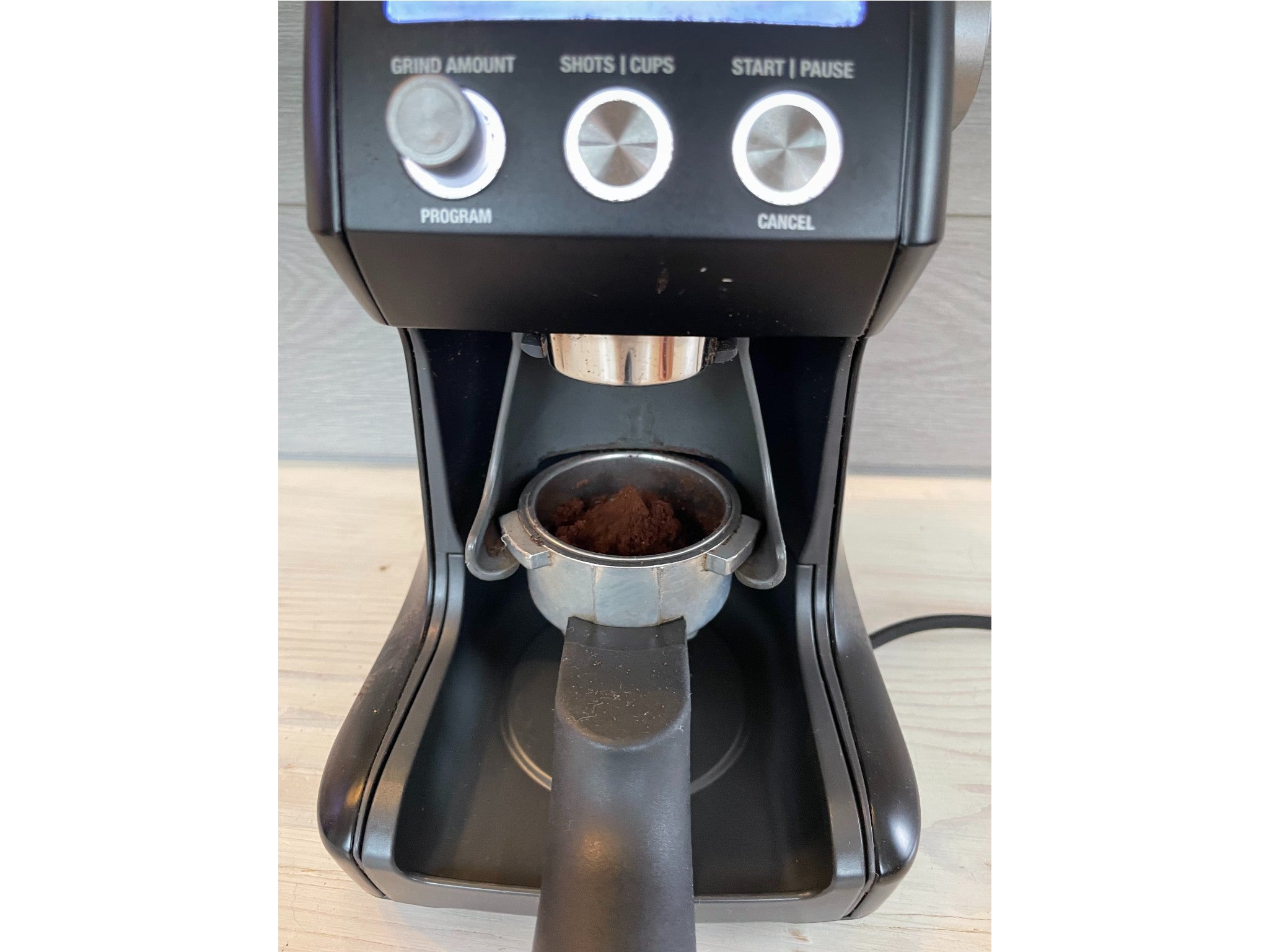 You can kick it into action by pushing the portafilter into its cradle – no button pressing necessary