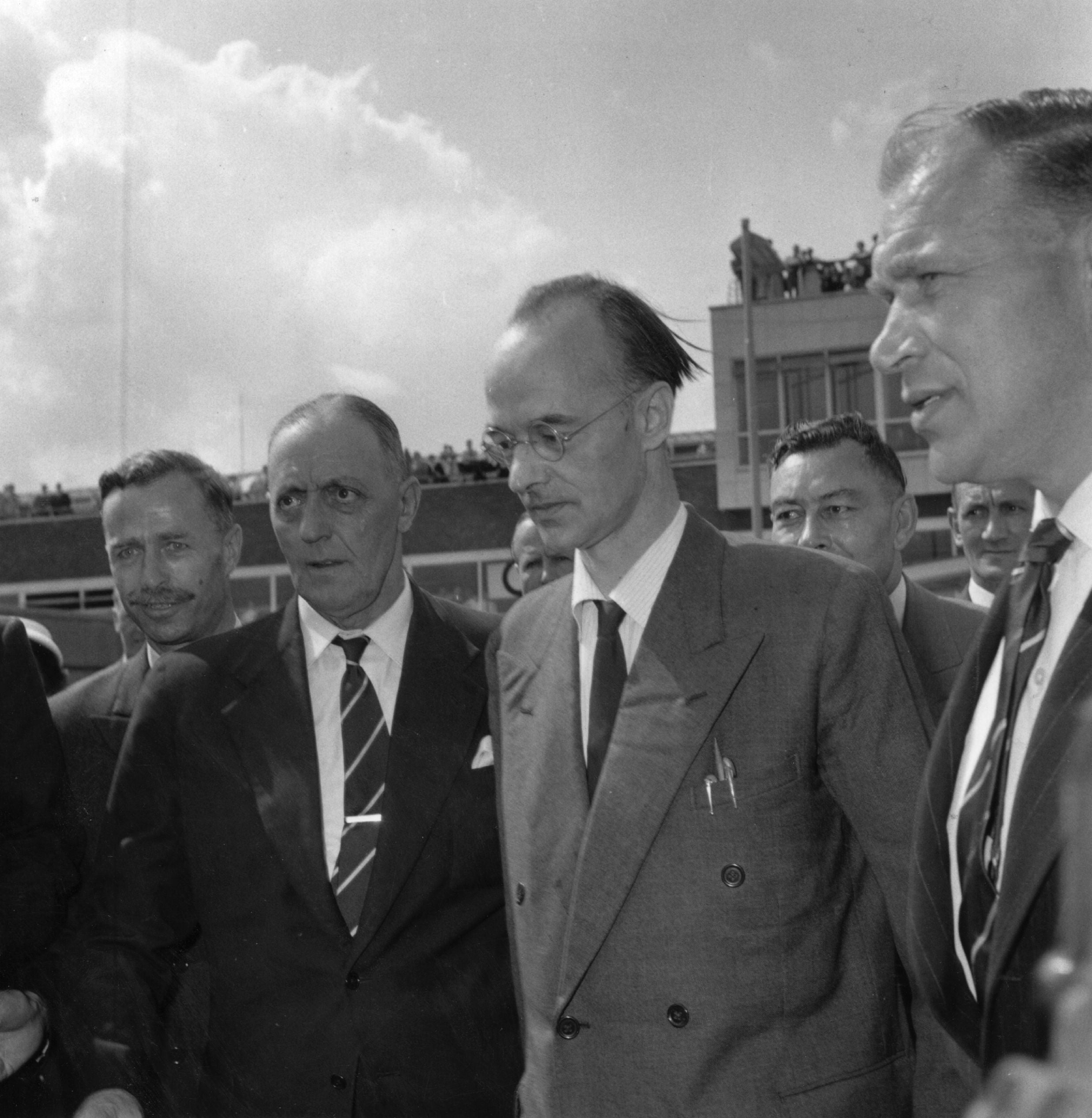 Fuchs, German-born British physicist and Soviet spy, leaving London airport under escort