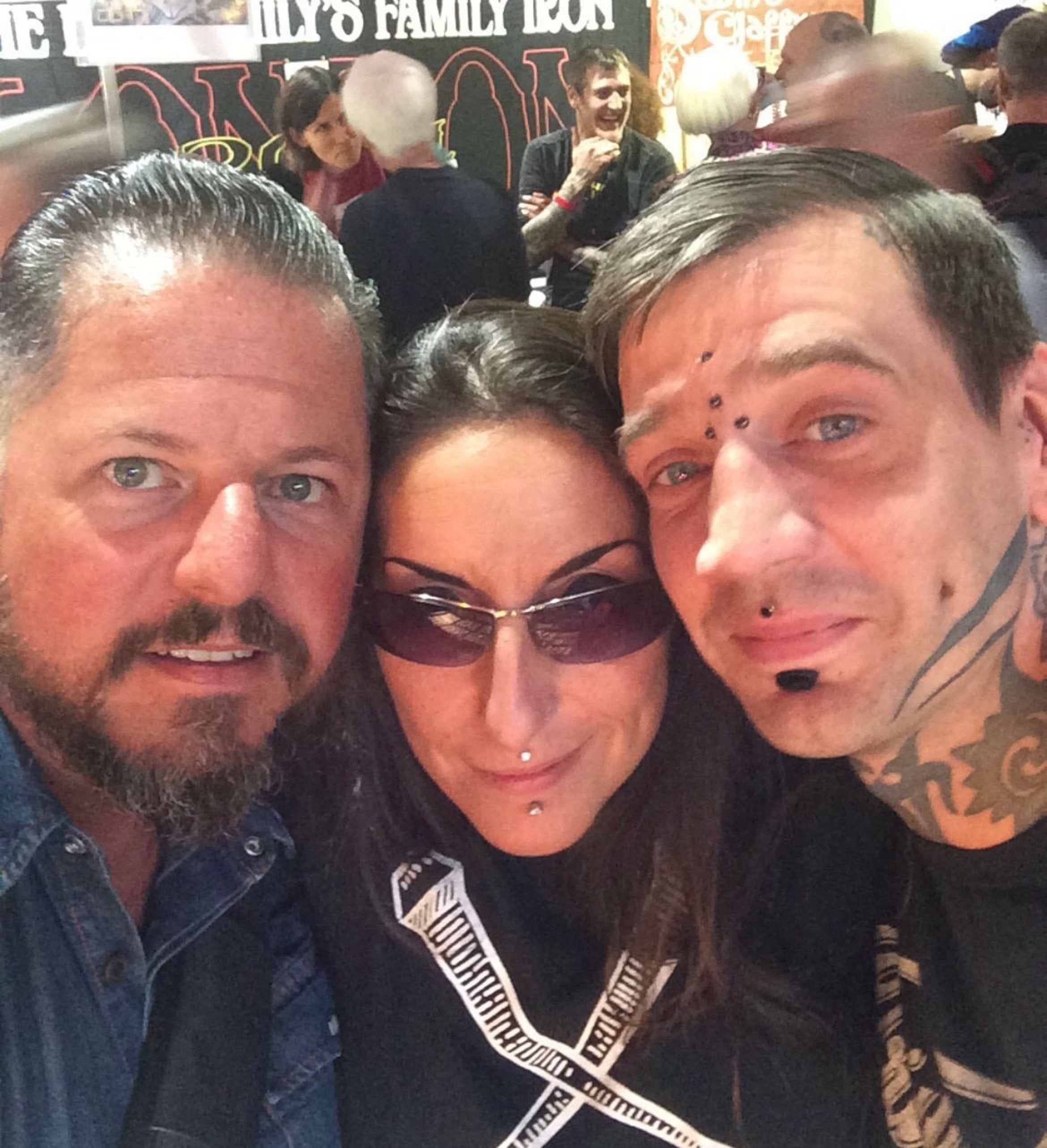 James Glover (right) with former colleague Tota Volpe-Landi (centre) with fellow tattoo worker Carlo (left) (Tota Volpe-Landi/PA)