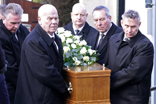 Pallbearers carry the coffin of Ray Illingworth (Danny Lawson/PA)