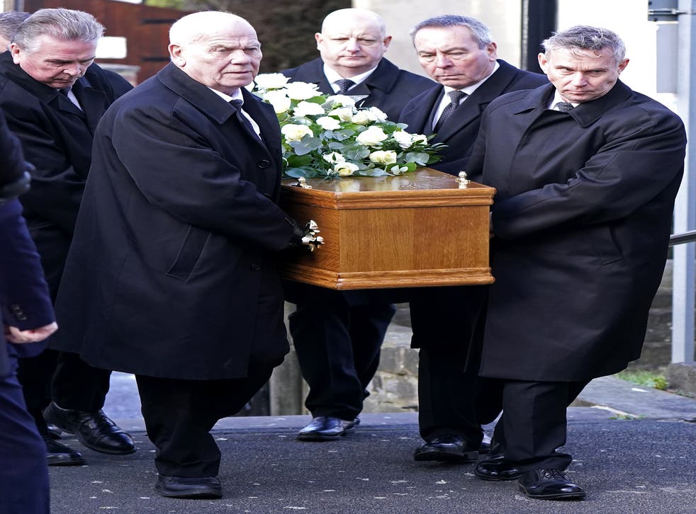 Pallbearers carry the coffin of Ray Illingworth (Danny Lawson/PA)