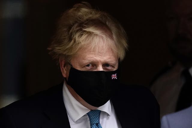 Prime Minister Boris Johnson leaves 10 Downing Street (PA)