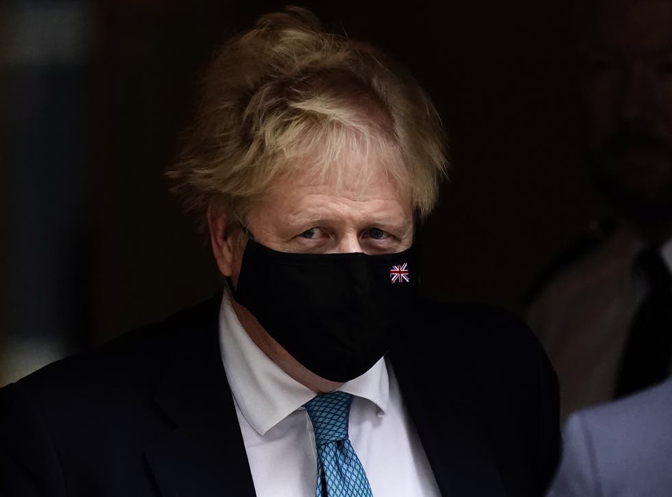Prime Minister Boris Johnson leaves 10 Downing Street (PA)