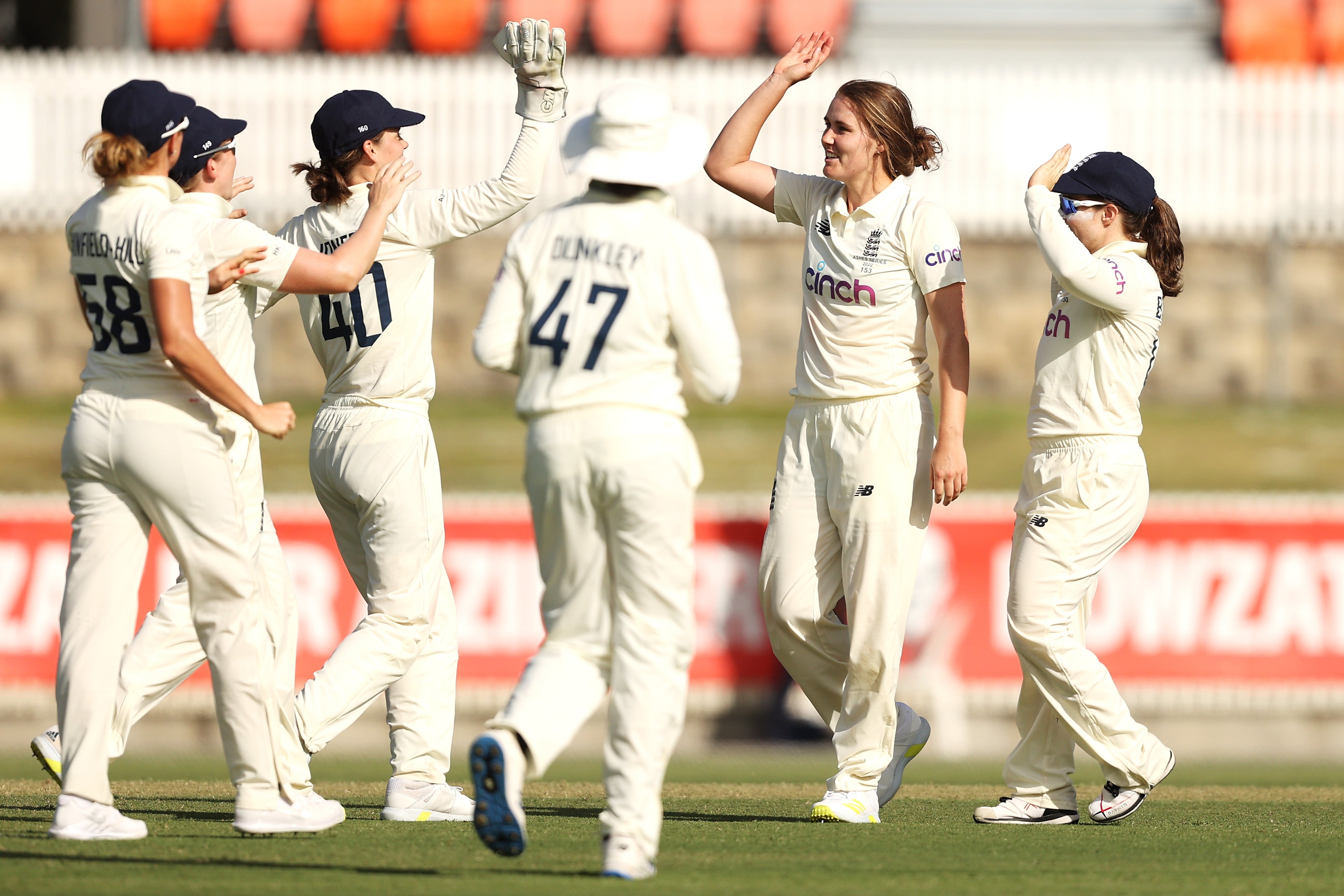 Nat Sciver celebrates after taking the wicket of Tahlia McGrath