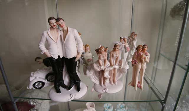 Same-sex wedding cake toppers (Niall Carson/PA)
