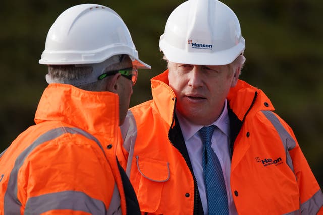 <p>Boris Johnson in hard hat and hi-vis, the symbols of getting on with the job </p>