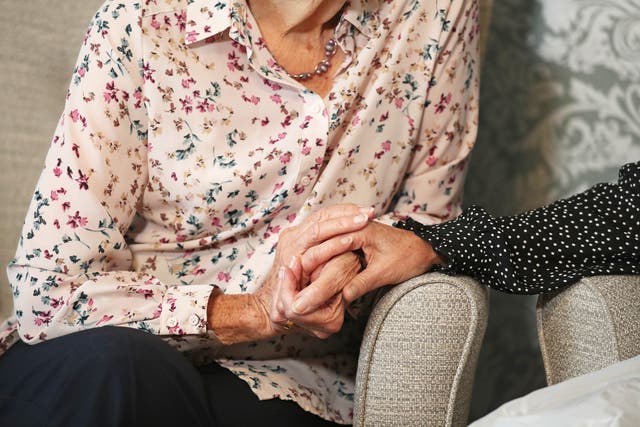Families of care home residents have cautiously welcomed plans to scrap visiting restrictions in England, but said the move comes “way too late” for those who died alone (PA)