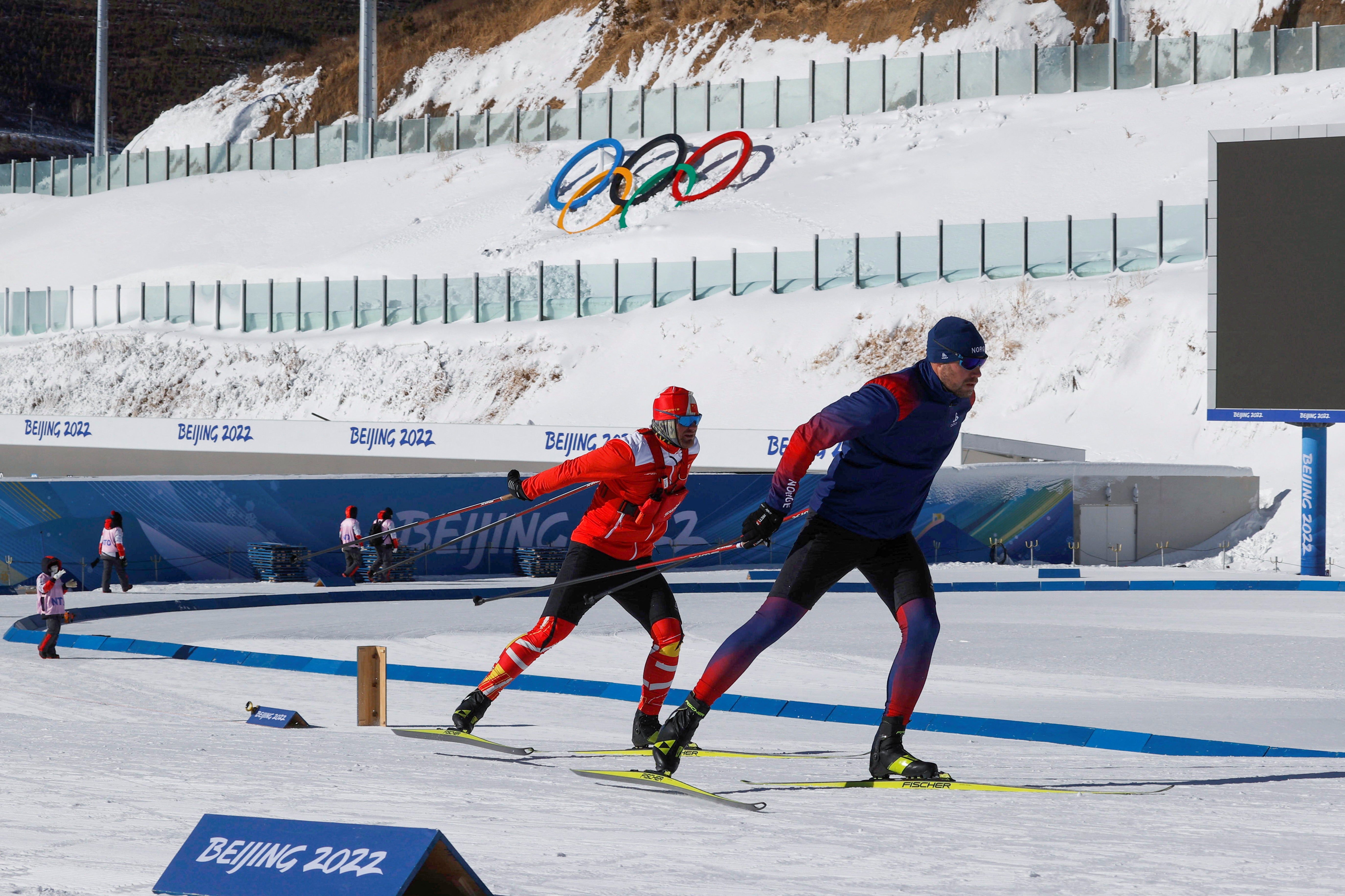 An athlete and his coach train at the National Biathlon Centre, ahead of the Winter Olympics