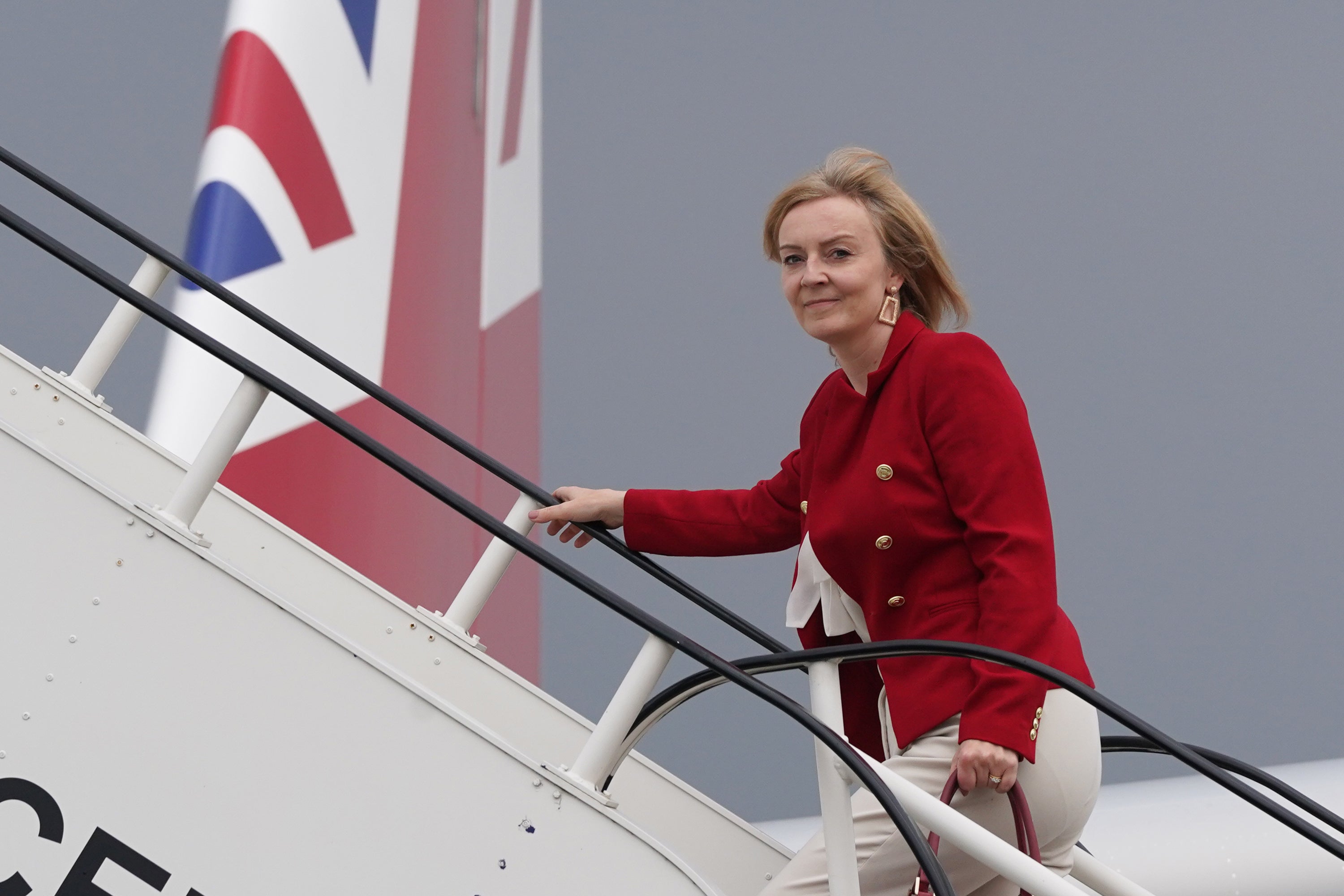 <p>Foreign Secretary Liz Truss boarding RAF Voyager – the government’s other private jet (Stefan Rousseau/PA)</p>