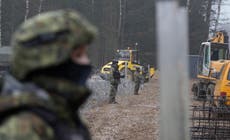 Poland starts building metal wall on border with Belarus