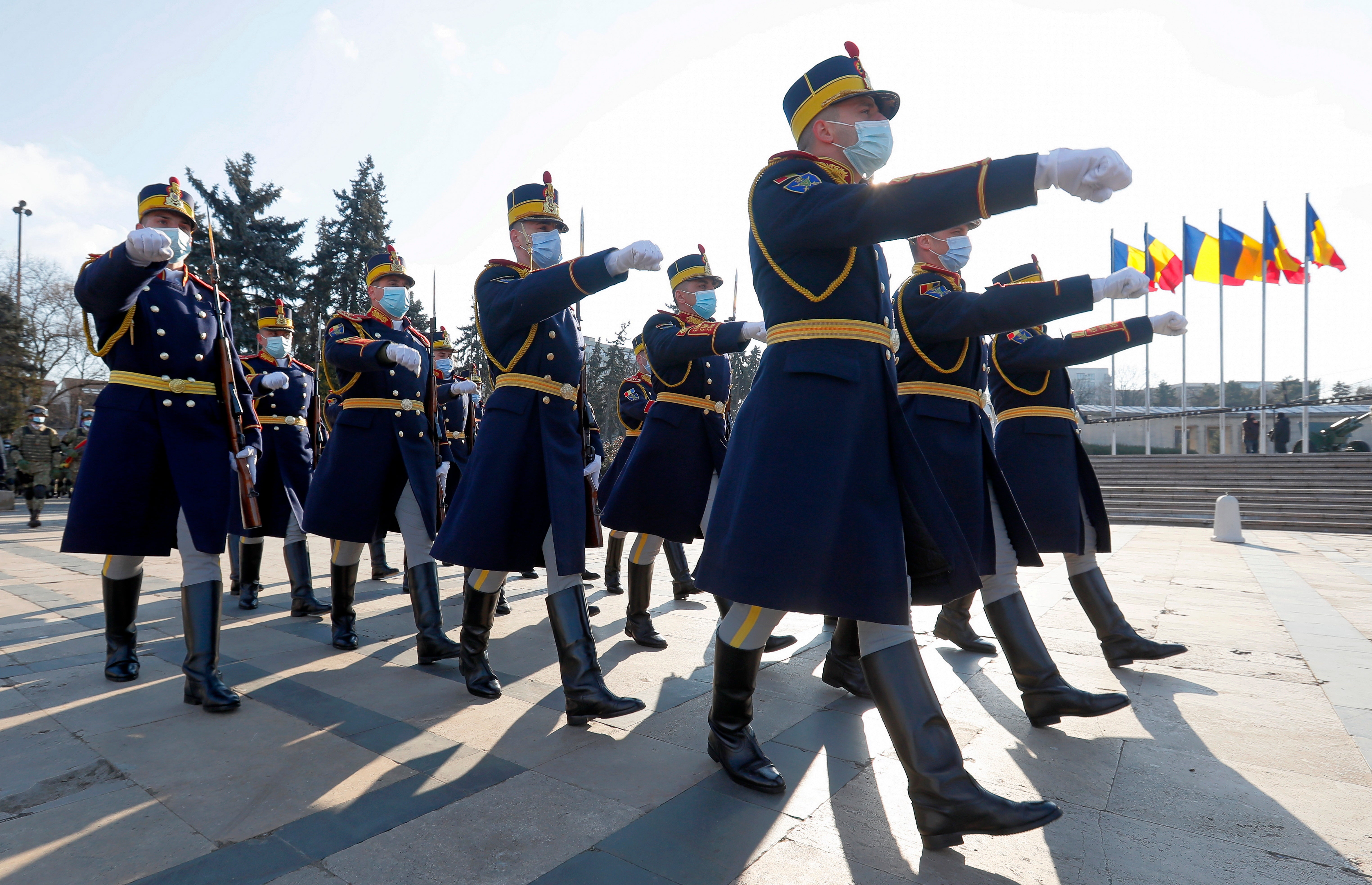 Romanian presidential honour guard soldiers march during a military ceremony held to mark Romania’s Little Union Day at the Tomb of the Unknown Soldier Memorial in Bucharest