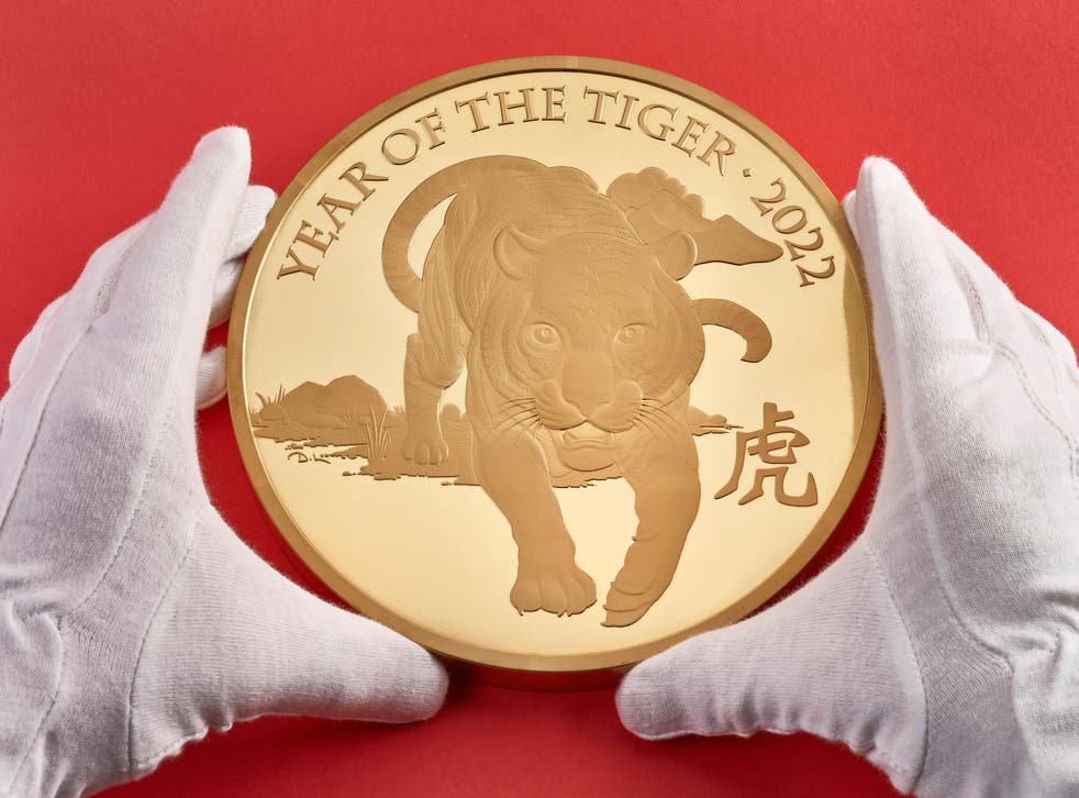 The Royal Mint has produced a giant gold coin to celebrate the Year of the Tiger (Royal Mint/PA)