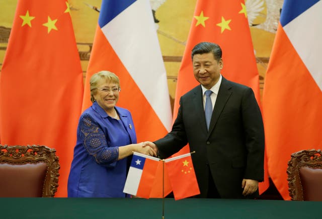 <p>Former Chilean President Michelle Bachelet (L) and Chinese President Xi Jinping attend a signing ceremony ahead of the Belt and Road Forum in Beijing, China in 2017</p>
