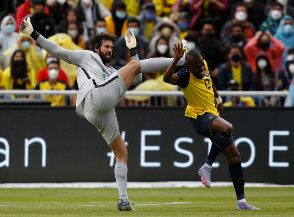 Alisson Becker was shown two red cards during Brazil’s 1-1 draw with Ecuador but both were overturned by VAR (Santiago Arcos/AP)