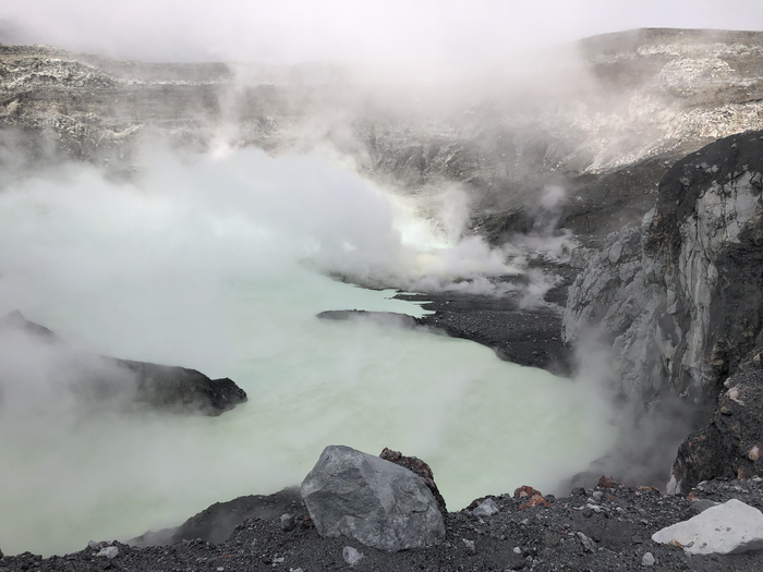 The extremely harsh Laguna Caliente lake in the crater of the Poás volcano, Costa Rica