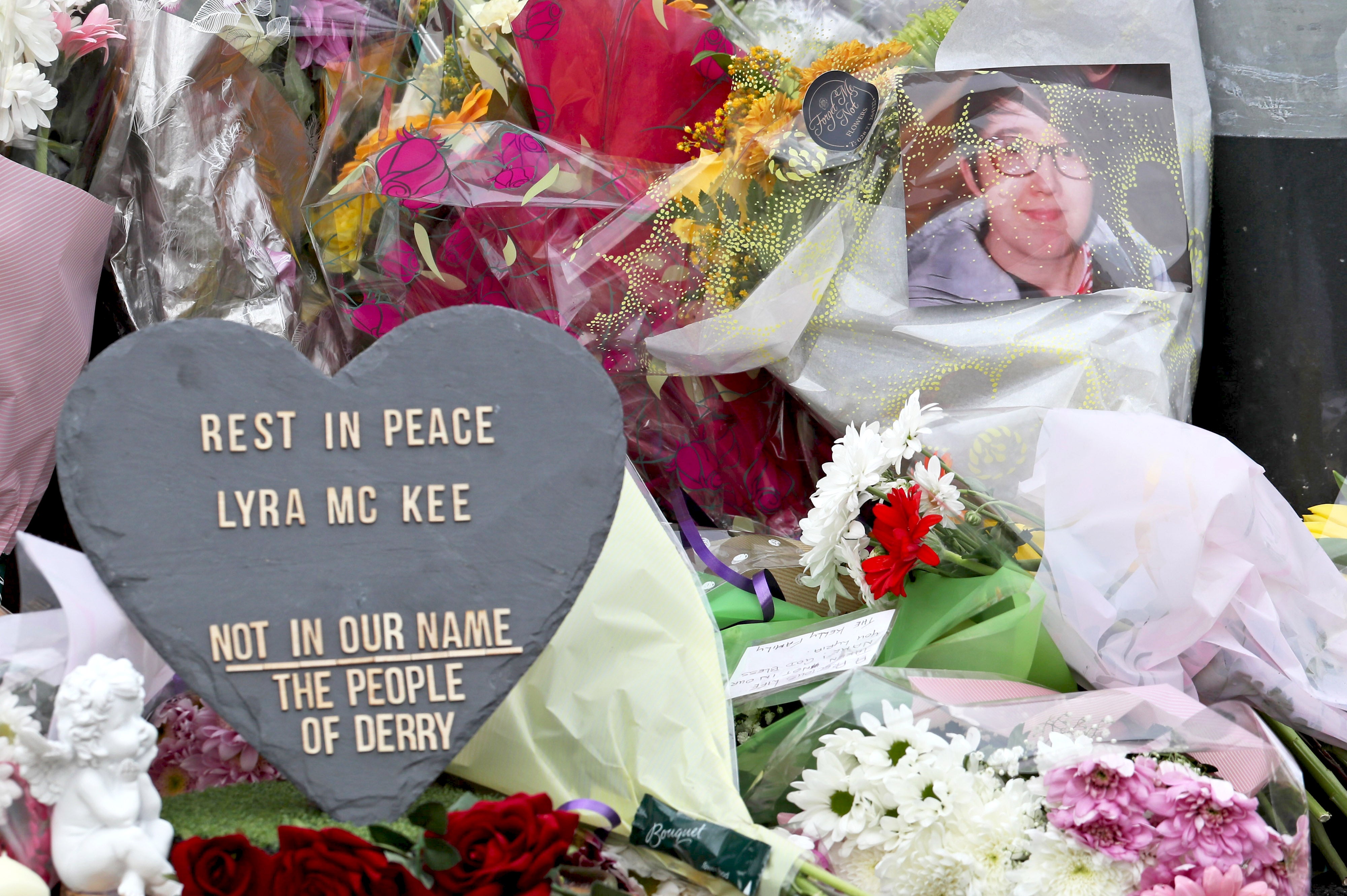 Flowers left at the scene where 29-year-old journalist Lyra McKee was shot in Derry on 18 April 2019