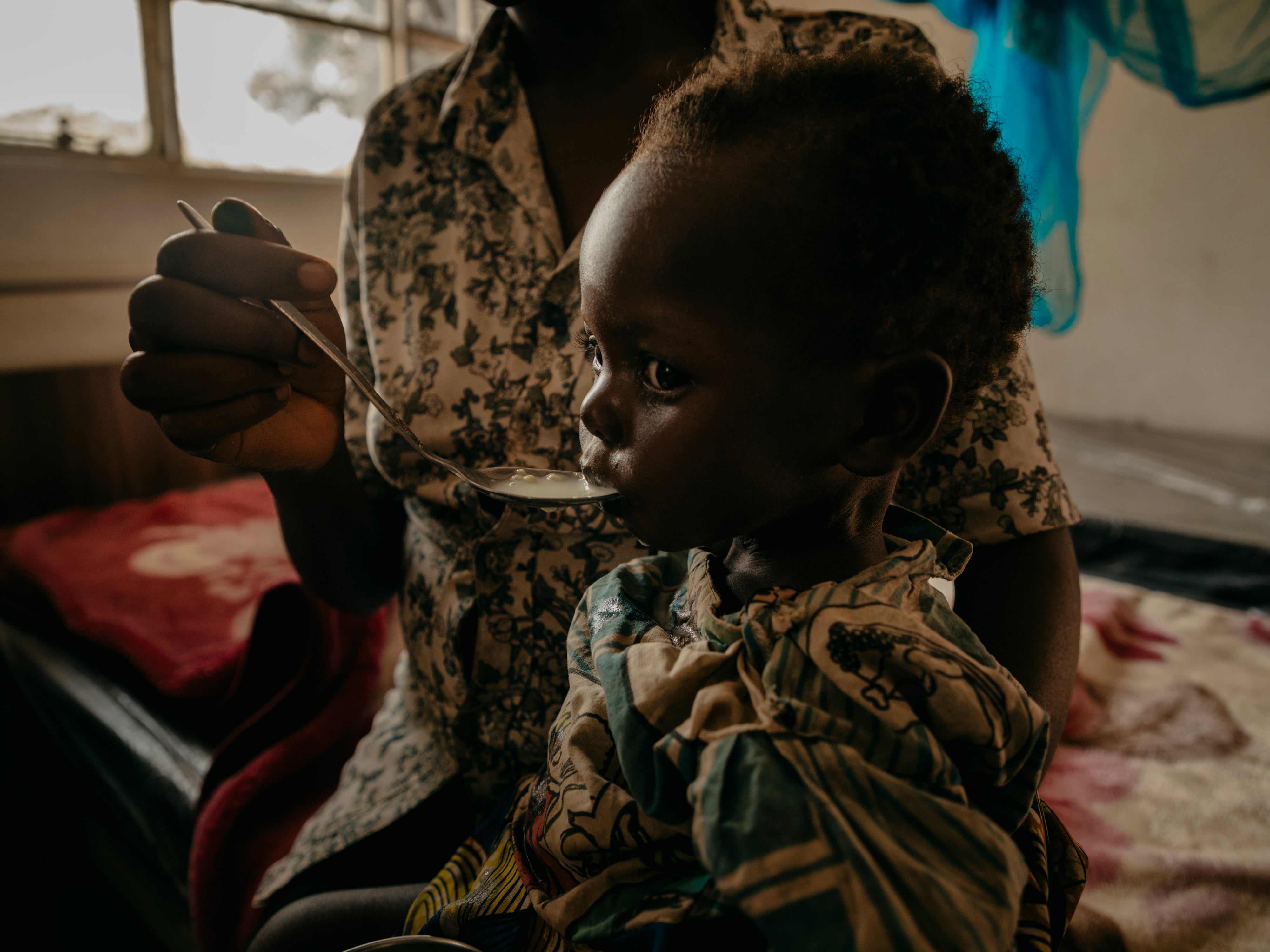 Her one-year-old baby daughter Eloise* receives treatment for malnutrition