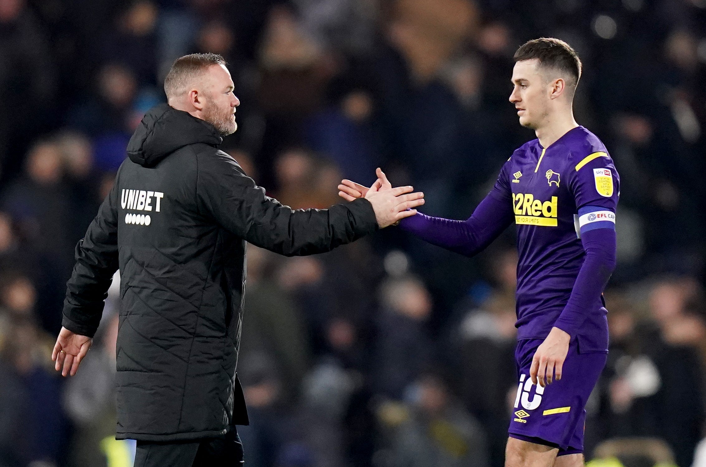 Wayne Rooney says administrators have assured him Tom Lawrence will not be leaving (Adam Davy/PA)