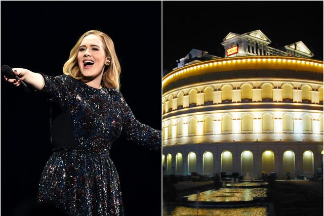 <p>Adele postponed her Las Vegas residency at the Caesars Palace Colosseum (right) last week</p>
