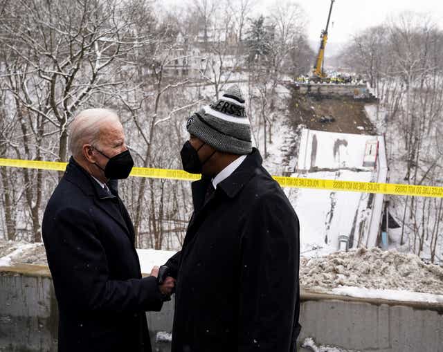 <p>President Joe Biden is greeted by Pittsburgh Mayor Ed Gainey at the site of a bridge collapse</p>