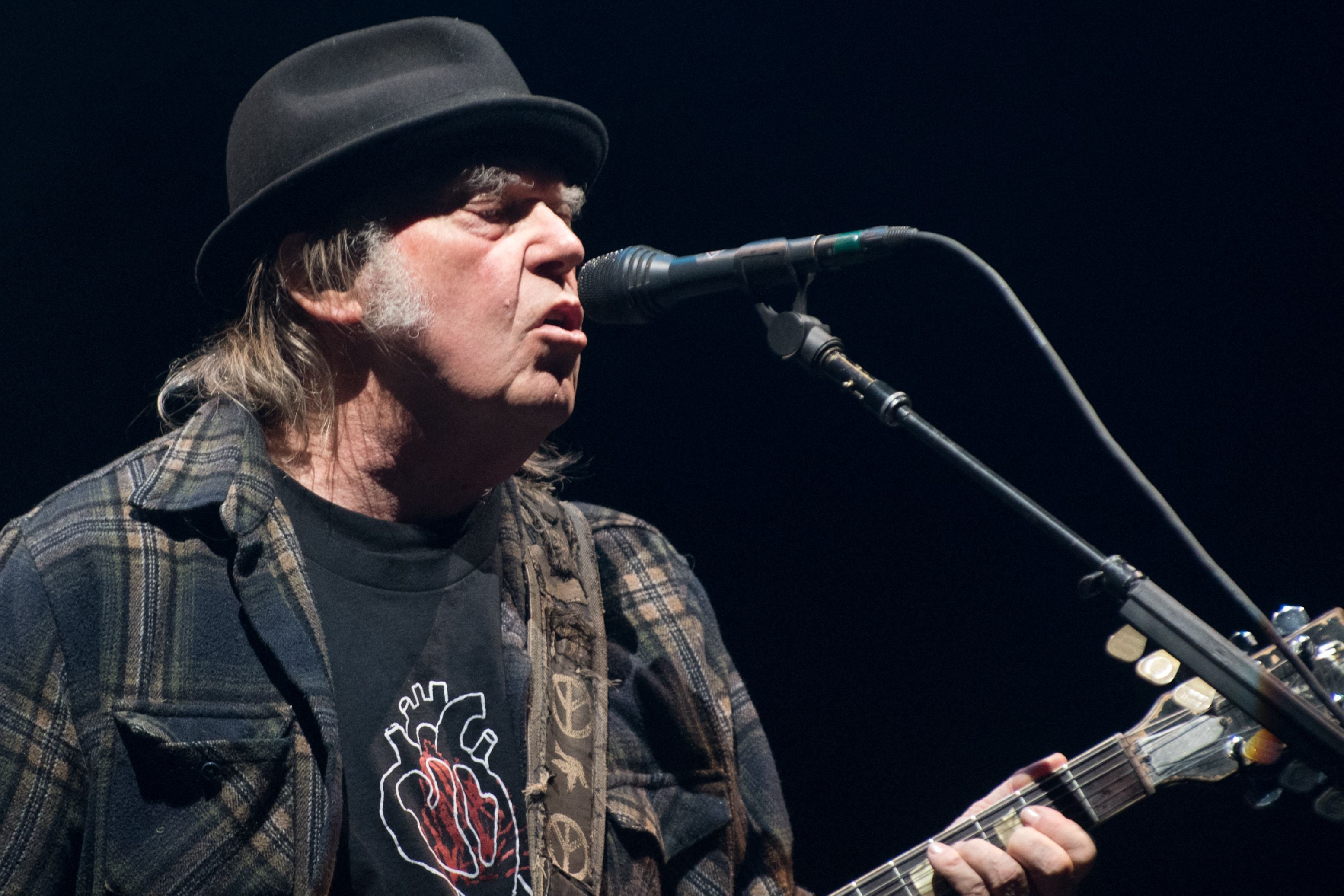 Neil Young on stage in Quebec in 2018