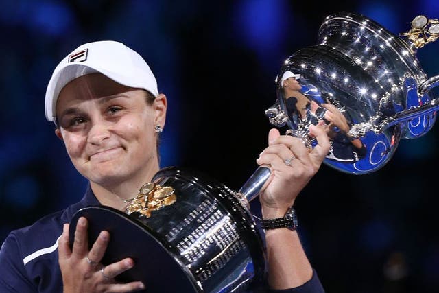 <p>Ashleigh Barty poses with the Australian Open trophy</p>