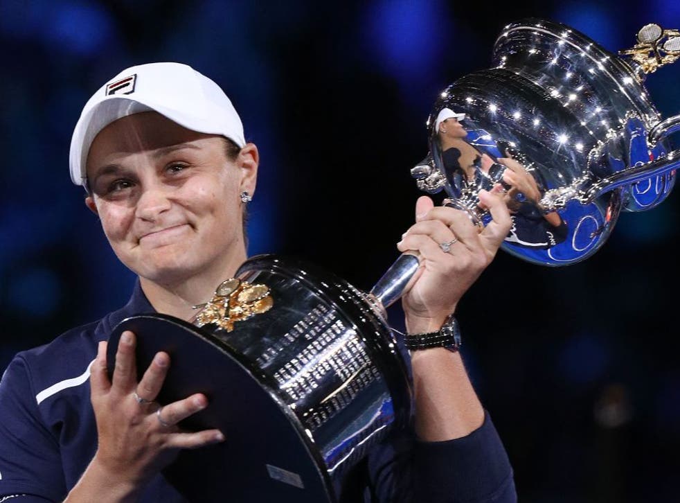 <p>Ashleigh Barty poses with the Australian Open trophy</p>