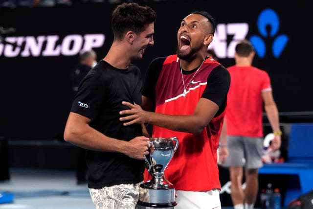 Nick Kyrgios, right, and Thanasi Kokkinakis enjoy their Australian Open victory (Simon Baker/AP)