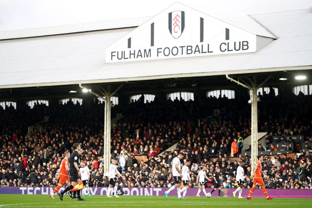 Fulham and Blackpool players left the field after play was stopped for a medical emergency in the stands at Craven Cottage (Adam Davy/PA)
